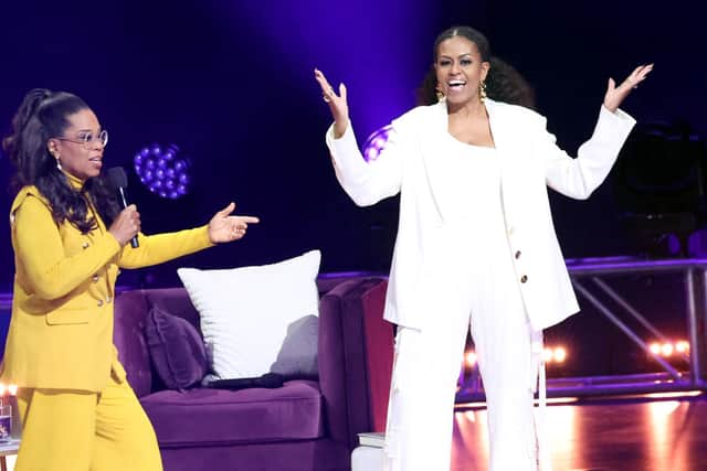 Oprah Winfrey and Michelle Obama speak onstage during The Light We Carry: Overcoming in Uncertain Times - in Conversation with Michelle Obama at YouTube Theater on December 13, 2022 in Inglewood, California. (Photo by Amy Sussman/Getty Images for ABA)