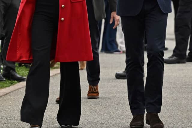 Kate Middleton looked super stylish in the 'Spencer' L.K. Bennett red coat she wore in Wales.  (Photo by Paul Ellis - WPA Pool/Getty Images)