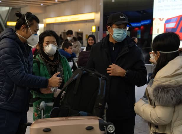 <p>People arrive at London Heathrow on a flight from Shanghai on 29 December, 2022. Credit: Getty Images</p>