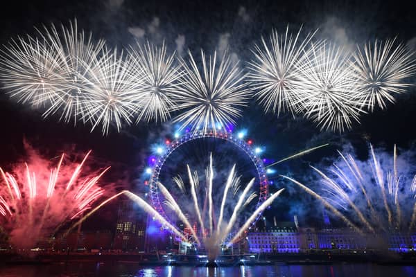 Fireworks explode around the London Eye during New Year's celebrations in central London just after midnight on January 1, 2020. (Photo by Daniel LEAL / AFP) (Photo by DANIEL LEAL/AFP via Getty Images)