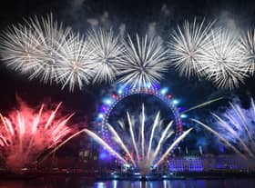 Fireworks explode around the London Eye during New Year's celebrations in central London just after midnight on January 1, 2020. (Photo by Daniel LEAL / AFP) (Photo by DANIEL LEAL/AFP via Getty Images)