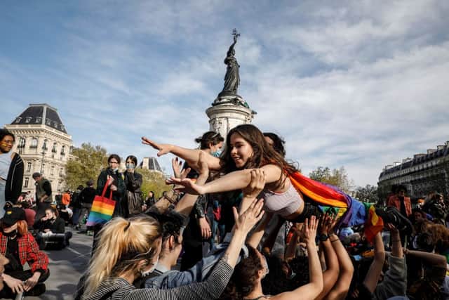 People gather in Paris for a LGBTQ+ rights rally. Credit: Getty Images