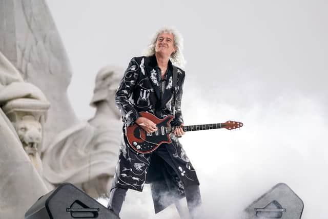 Brian May of Queen performs during the Platinum Party At The Palace at Buckingham Palace. Credit: Alberto Pezzali - WPA Pool/Getty Images