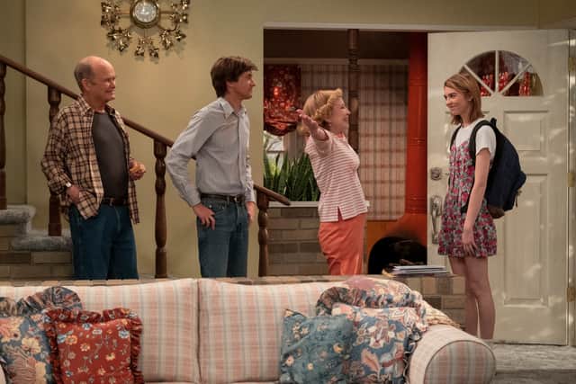 Kurtwood Smith as Red, Topher Grace as Eric, Debra Jo Rupp as Kitty, and Callie Haverda as Leia in That 90s Show (Credit: Patrick Wymore/Netflix)