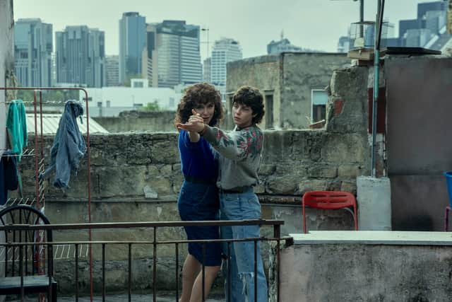 Valeria Golino as Vittoria and Giordana Marengo as Giovanna in The Lying Life of Adults, dancing on the rooftop (Credit: Eduardo Castaldo/Netflix)