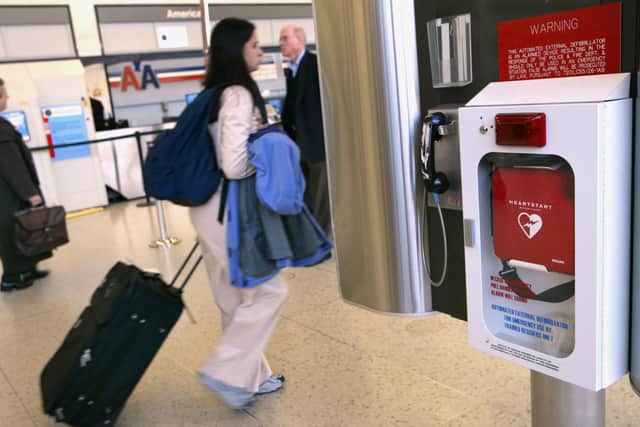 Travelers pass an Automated External Defibrillator (AED) in Terminal 3 of O’Hare International Airport in Chicago (Photo: Tim Boyle/Getty Images)