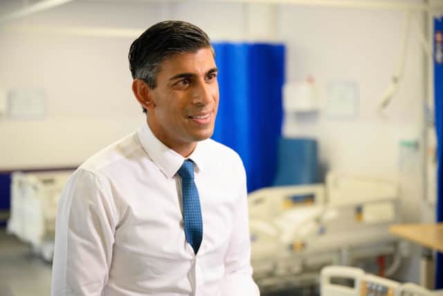 Prime Minister Rishi Sunak speaks to members of the media during his visit to Croydon University Hospital in south London. Credit: LEON NEAL/POOL/AFP via Getty Images