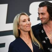 Aaron Taylor-Johnson looking adoringly at his wife Sam. (Photo by CHRISTOPHE ARCHAMBAULT/AFP via Getty Images)