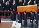 Pallbearers carry the coffin of Pope Emeritus Benedict XVI at the end of his funeral mass at St. Peter’s square in the Vatican (Photo: FILIPPO MONTEFORTE/AFP via Getty Images)