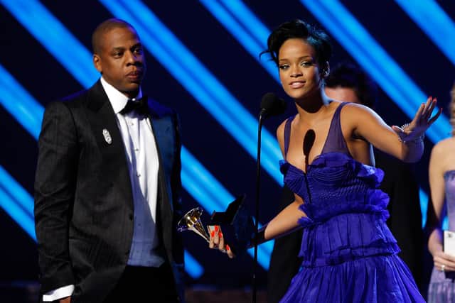 Rapper Jay-Z (L) and singer Rihanna accept the Best Rap/Sung Collaberation award onstage during the 50th annual Grammy awards held at the Staples Center on February 10, 2008 in Los Angeles, California. (Photo by Kevin Winter/Getty Images)