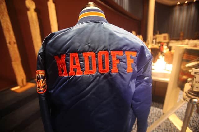 A Madoff New York Mets baseball jacket is displayed during a press preview of a U.S. Marhals Service auction of personal property seized from Bernie and Ruth Madoff in 2009 (Photo: Mario Tama/Getty Images)