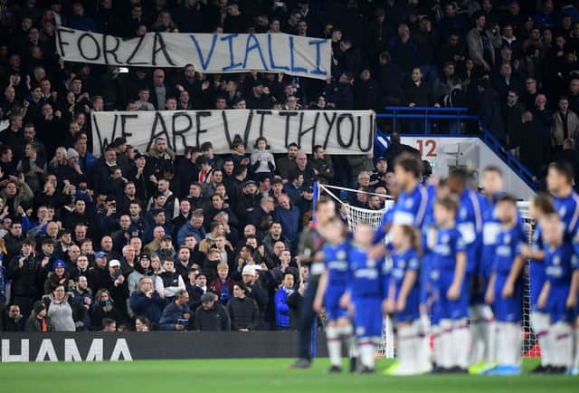 Fans hold up a banner in support for former Chelsea coach Gianluca Vialli during the Carabao Cup Round of 16 match between Chelsea and Manchester United at Stamford Bridge on October 30, 2019. Credit: Michael Regan/Getty Images