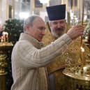 Russian President Vladimir Putin attends a Christmas liturgy at the Transfiguration Cathedral in Saint Petersburg in 2020 (Photo: ALEXEY NIKOLSKY/SPUTNIK/AFP via Getty Images)