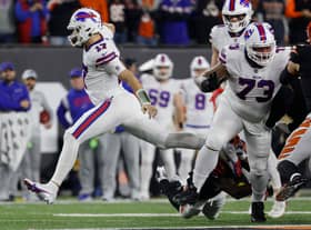 CINCINNATI, OHIO - JANUARY 02: Josh Allen #17 of the Buffalo Bills carries the ball against the Cincinnati Bengals during the first quarter at Paycor Stadium on January 02, 2023 in Cincinnati, Ohio. (Photo by Kirk Irwin/Getty Images)