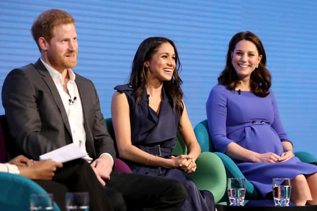 Meghan and Kate enjoying each other's company. Photograph by CHRIS JACKSON/AFP via Getty Images)