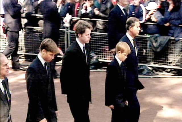 Prince Harry walks behind Princess Diana’s coffin at her funeral
