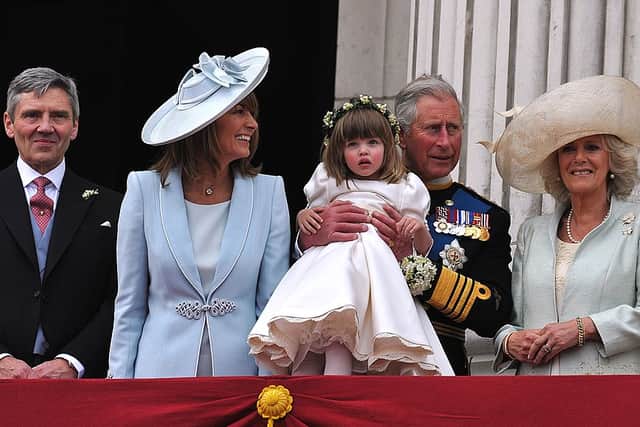 Carole and Michael Middleton (left) seen on the Buckingham Palace balcony with Prince Williams father now-King Charles (Pic:Getty)