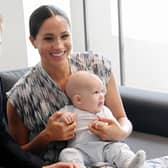 Prince Harry, Meghan Markle and their son Archie when he was a baby.
