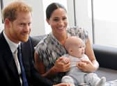 Prince Harry, Meghan Markle and their son Archie when he was a baby.