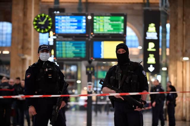 French police stand guard in a cordonned off area at Paris’ Gare du Nord train station. Credit: JULIEN DE ROSA/AFP via Getty Images