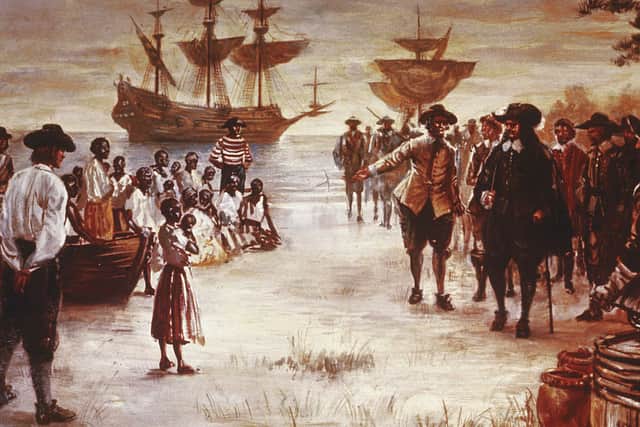 An engraving shows the arrival of a Dutch slave ship with a group of African slaves for sale in Jamestown, Virginia, 1619. Credit: Hulton Archive/Getty Images