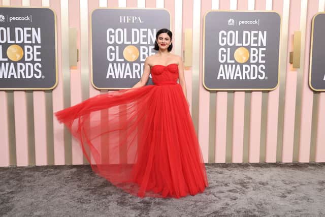 I thought Maverick star Monica Barbaro looked incredible in this red Dolce & Gabbana gown. (Photo by Amy Sussman/Getty Images)