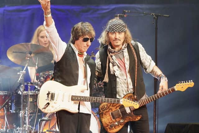 Actor Johnny Depp (right) at the Royal Albert Hall, London, appearing alongside Jeff Beck. Picture date: Tuesday May 31, 2022. (Photo: PA/Raph Pour-Hashemi)