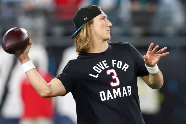 Trevor Lawrence #16 of the Jacksonville Jaguars warms up while wearing a shirt in support of Buffalo Bills safety Damar Hamlin prior to a game against the Tennessee Titans at TIAA Bank Field on January 07, 2023 in Jacksonville, Florida. Hamlin suffered cardiac arrest during the Bills’ Monday Night Football game against the Cincinnati Bengals and remains in intensive care. (Photo by Mike Carlson/Getty Images)