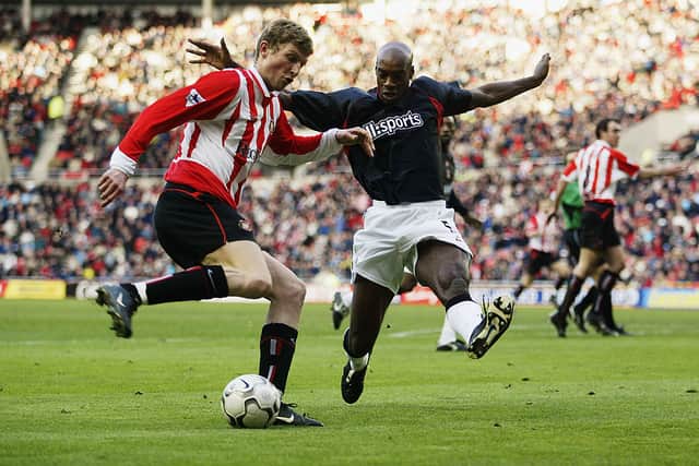 Richard Rufus blocks Tore Andre Flo of Sunderland. Credit: Gary M. Prior/Getty Images