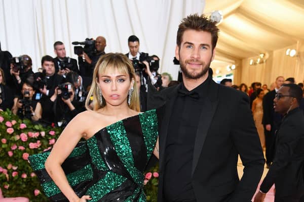 Miley Cyrus and Liam Hemsworth attend The 2019 Met Gala (Photo by Dimitrios Kambouris/Getty Images for The Met Museum/Vogue)