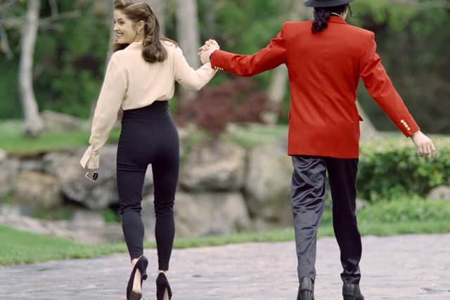 Lisa Marie Presley walking with her former husband Michael Jackson at his Neverland Ranch in 1995 (Photo: AFP via Getty Images)