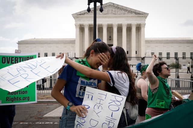 Abortion rights activists react to the overturning of Roe v Wade. Credit: Getty Images