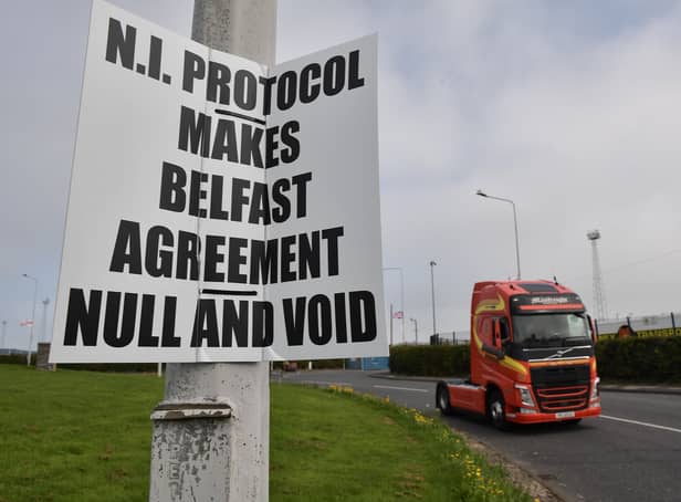 <p>Signs outside Larne Harbour in Northern Ireland (Photo: Getty Images)</p>