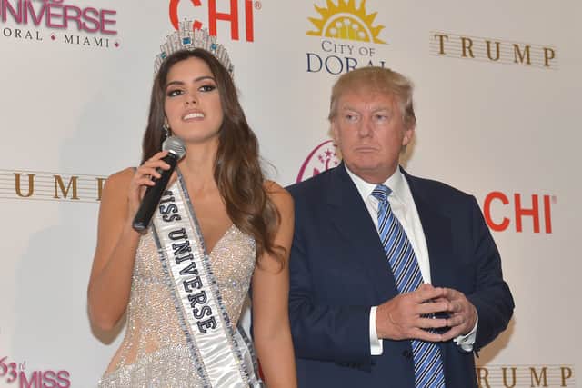 Miss Universe Paulina Vega and Donald Trump attend The 63rd Annual Miss Universe Pageant winner press conference at Trump National Doral on January 25, 2015 (Credit: Getty Images)
