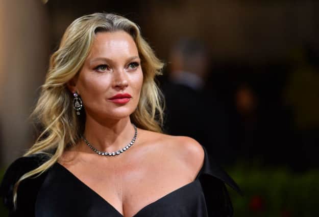 It is hard to believe that the effortlessly stylish Kate Moss turns 49 today. (Photo by ANGELA WEISS/AFP via Getty Images)