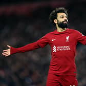 Mohamed Salah celebrates scoring against Wolves in their first match