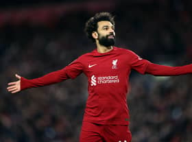 Mohamed Salah celebrates scoring against Wolves in their first match