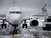 Manchester Airport closes both its runways due to heavy snow