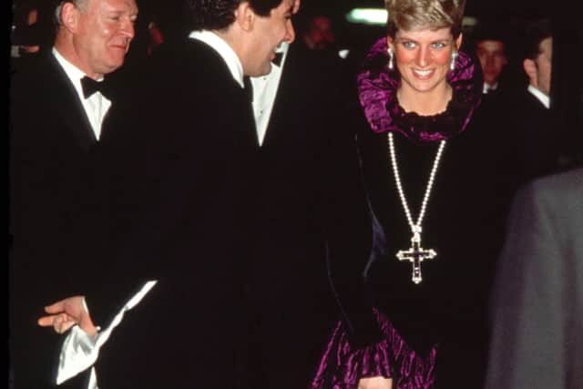 The late Princess Diana wearing the cross at the Birthright charity event. Photograph courtesy of Sothebys. 