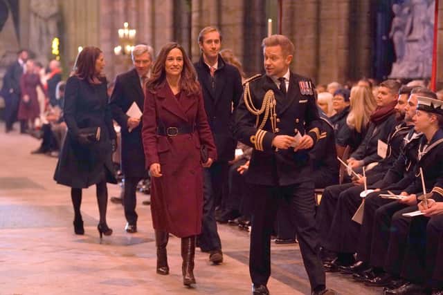 Pippa Middleton also wore burgundy to the The 'Together at Christmas' Carol Service. Photo by Kirsty O'Connor - Pool/Getty Images)