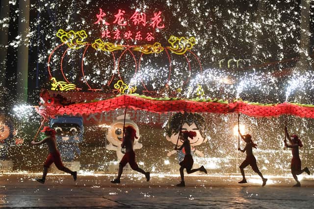 Dragon dancers perform at a park in Beijing during Lunar New Year. (Getty Images)