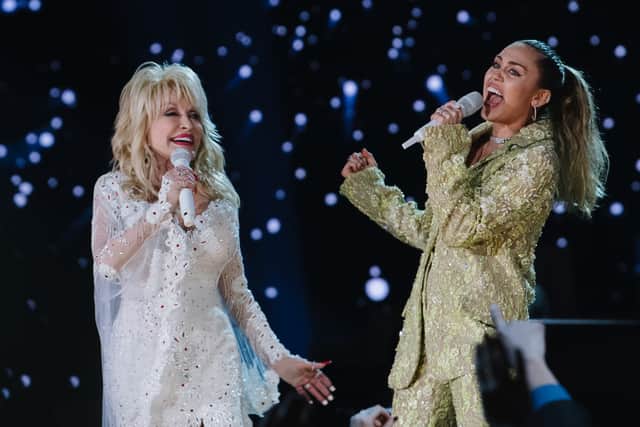 Dolly Parton showed her rock credentials when she teamed up with goddaughter Miley Cyrus on New Years Eve (Credit: Getty Images)