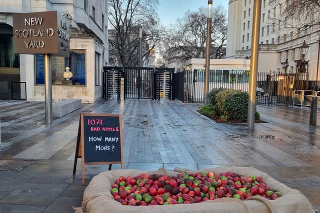 Women’s charity Refuge has placed 1,071 ‘bad apples’ outside the Met Police HQ in London. Photo: LondonWorld