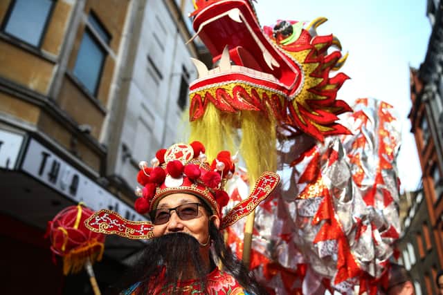 Performers participate in the Chinese Lunar New Year parade on January 26, 2020 in London, England. 2020 is the Year of the Rat. (Photo by Hollie Adams/Getty Images)