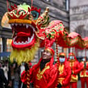 Members of the Scottish Chinese community take part in Edinburgh Chinese New Year Festival in January 2022 (Photo: Jeff J Mitchell/Getty Images)