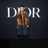 Robert Pattinson is the latest star to embrace the 'skirt' trend. . (Photo by Pascal Le Segretain/Getty Images for Christian Dior)