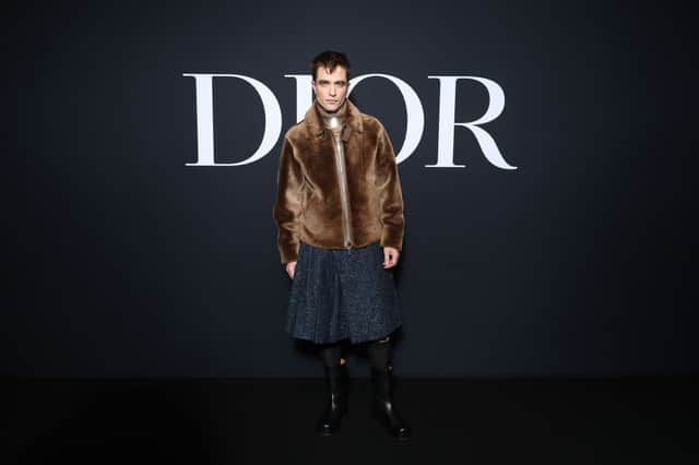 Robert Pattinson is the latest star to embrace the 'skirt' trend. . (Photo by Pascal Le Segretain/Getty Images for Christian Dior)