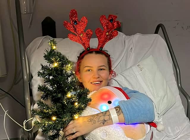 Casey Singleton, 22, who suffered a her Christmas lunch table on Dec 25 (in hospital over Christmas). Picture: SWNS