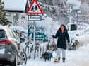 <p>A member of the public makes their way through the snow on 18 January 2023 in Carrbridge, United Kingdom (Photo: Jeff J Mitchell/Getty Images)</p>
