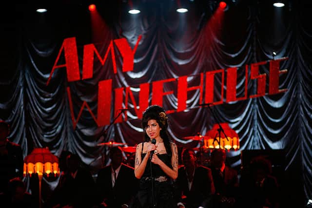 British singer Amy Winehouse performs at the Riverside Studios for the 50th Grammy Awards ceremony via video link on February 10, 2008 in London, England.  (Photo by Peter Macdiarmid/Getty Images for NARAS)